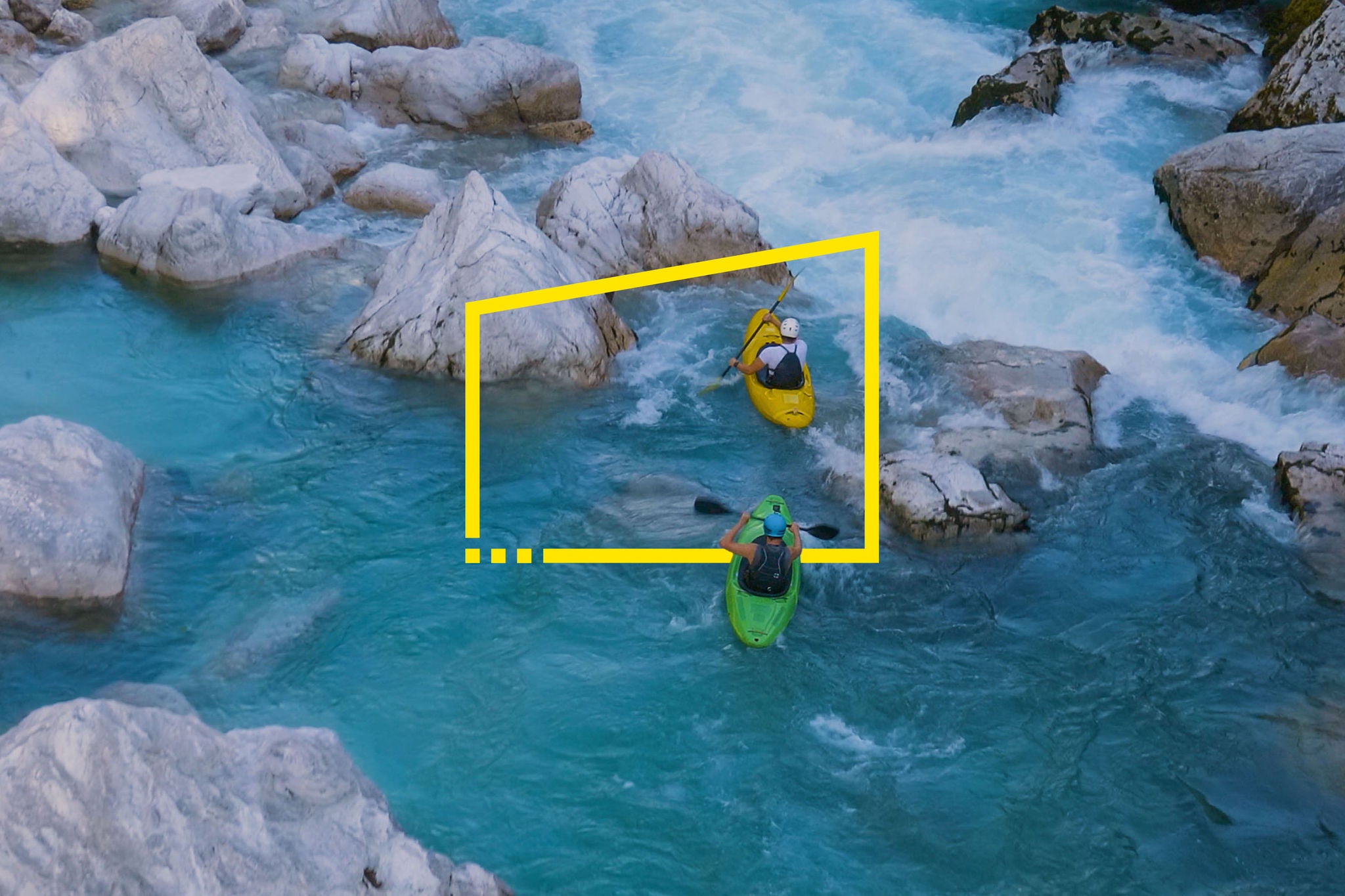 Two men kayaking through a rough river